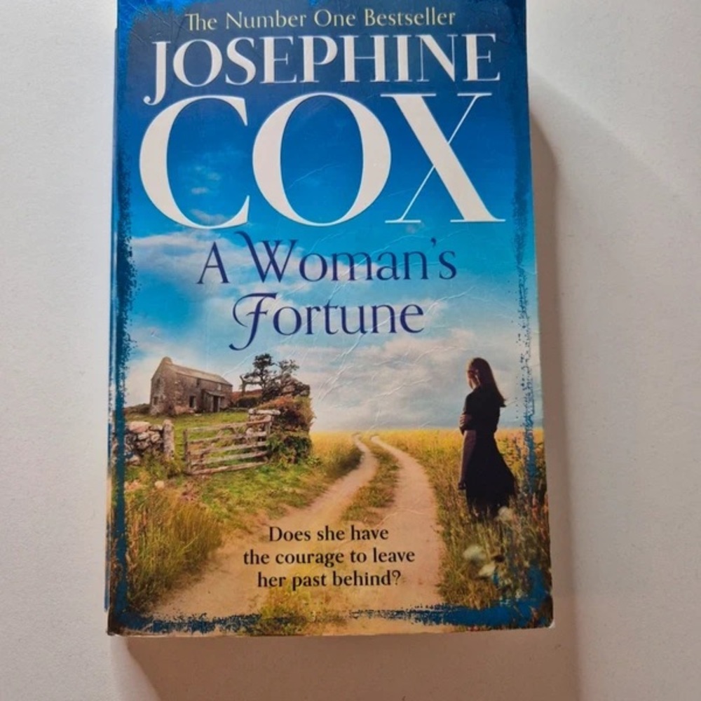 "A Woman's Fortune" Coffee Table Book - Blue